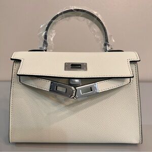 Genuine Epsom Leather mini handbag with shoulder strap featuring Silver hardware